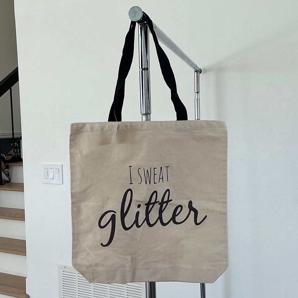Stylish Tan Tote Bag with Black Handles